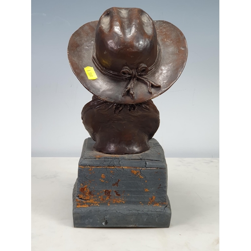 522 - A painted bronzed Figure of a Boy wearing a Hat and Neckerchief, 1ft High.