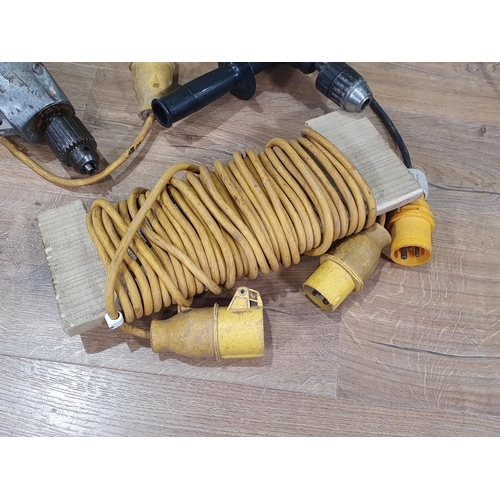 539 - A Makita Hammer Drill, a Bosch Hammer Drill, a Transformer, a four way Connector and extension Cable... 