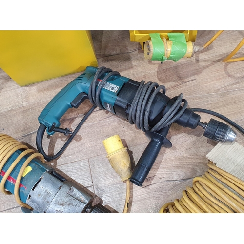 539 - A Makita Hammer Drill, a Bosch Hammer Drill, a Transformer, a four way Connector and extension Cable... 