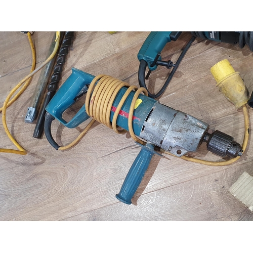 539 - A Makita Hammer Drill, a Bosch Hammer Drill, a Transformer, a four way Connector and extension Cable... 