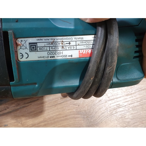 539 - A Makita Hammer Drill, a Bosch Hammer Drill, a Transformer, a four way Connector and extension Cable... 