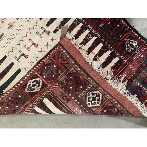 543 - A Pakistan Bokhara Rug with three rows of medallions on a red and maroon ground, 6ft x 4ft 6ft x 4ft... 