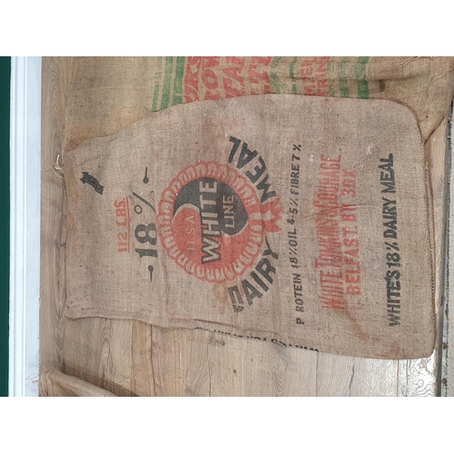 546 - Five hessian Sacks with various advertising logos (some repairs).