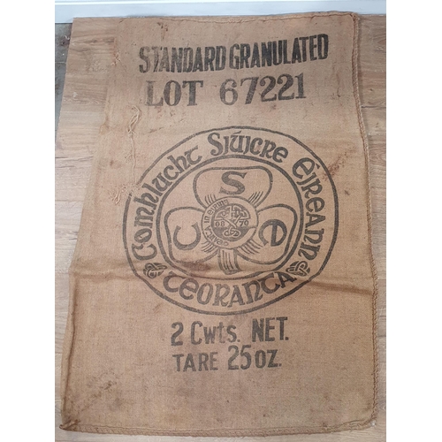 547 - Five hessian Sacks with various advertising logos (some repairs).