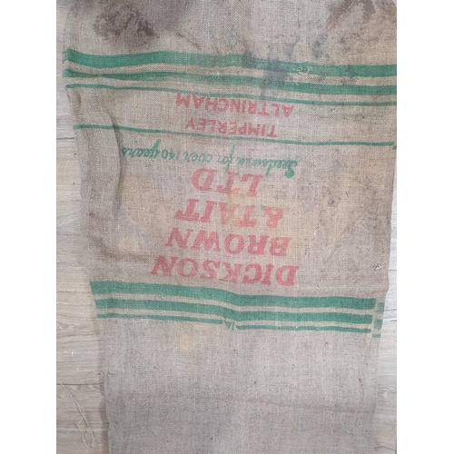 550 - Five hessian Sacks with various advertising logos (some repairs).