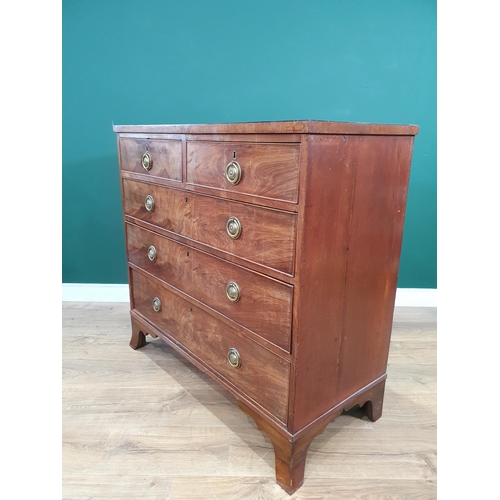 573 - A 19th Century mahogany Chest of two short, three long graduated drawers with brass ring handles, an... 