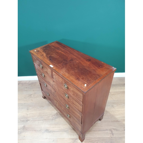 573 - A 19th Century mahogany Chest of two short, three long graduated drawers with brass ring handles, an... 