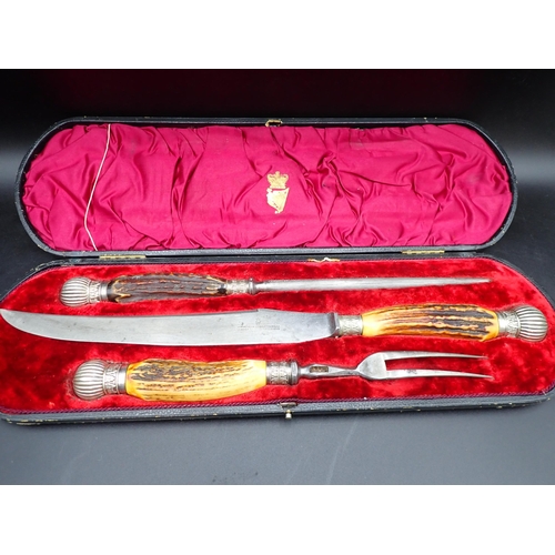 59 - A good quality plated mounted stag-handled three piece Carving Set by Wingfield, Rowbotham & Co, in ... 