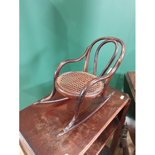 607 - An Eastern brass Tray top Table, a mahogany Cake Stand A/F,  an oval floral inlaid Tray, two Standar... 