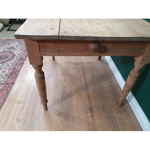 8 - A small pine Kitchen Table fitted single drawer, raised on turned and tapered supports, (Woodworm in... 