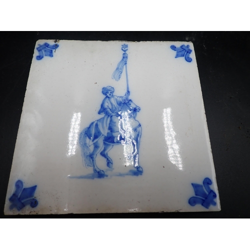 84 - Fourteen delft blue and white Tiles decorated Figures on horseback