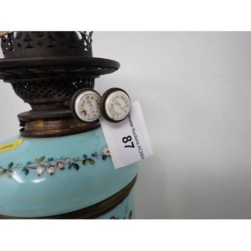 87 - A Victorian opaque glass Oil Lamp painted fruit urn, bird etc with Hinks Duplex Patent mechanism.