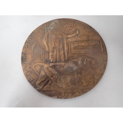 92 - A Bronze Death Plaque for Joseph Horne and four Second World War War Medals  to R.E. Lloyd with orig... 