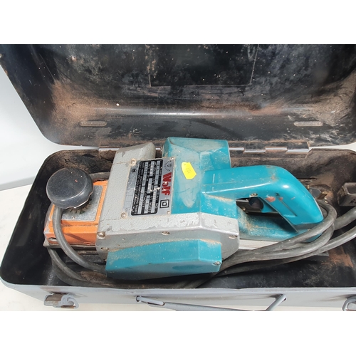 260 - A Wolf heavy duty electric Planer in metal case (passed PAT)