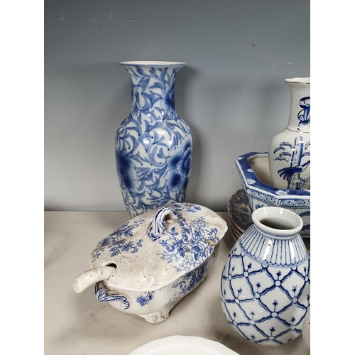 271 - A quantity of blue and white transfer decorated Plates, Tureens, pair of Vases, another baluster Vas... 