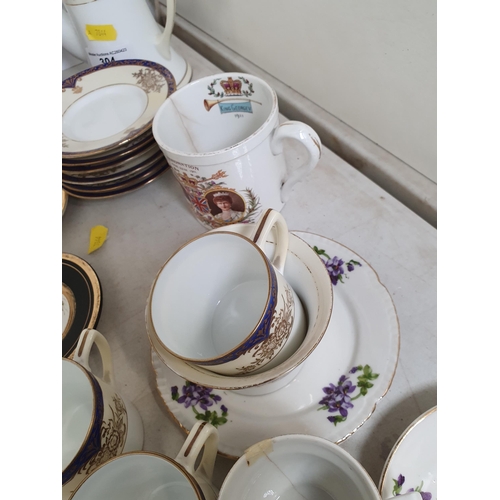 304 - A Noritake part Coffee Service, Teaware, a Winnie the Pooh Figure Group, etc