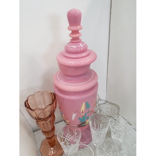 322 - A quantity of glassware including a large pink glass Jar and Cover, a green glass Table Lustre, a Va... 