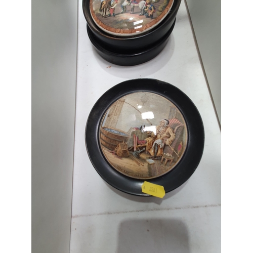 348 - Seven framed Prattware pot Lids