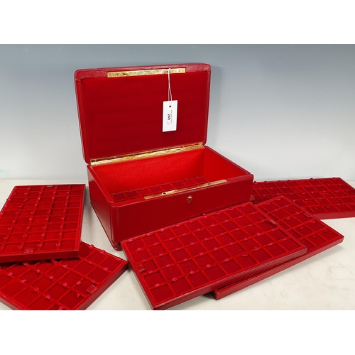 249 - A red leather Coin Collectors Case with padded lid, fall front, enclosing six lift out storage trays... 