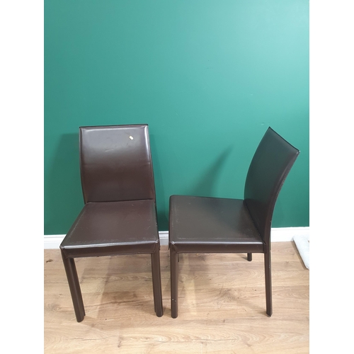 42 - A set of Ten metal framed leather style Dining Chairs.