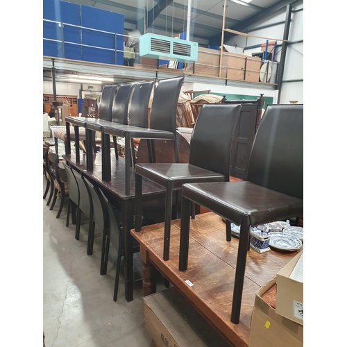 42 - A set of Ten metal framed leather style Dining Chairs.