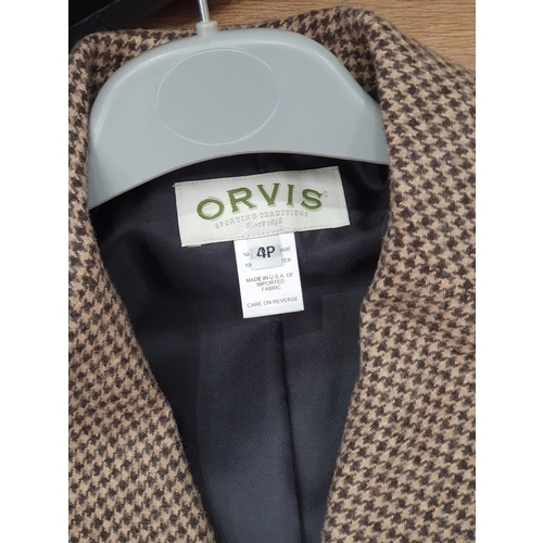 288 - An upholstered Ottoman and an Orvis Ladies Jacket.