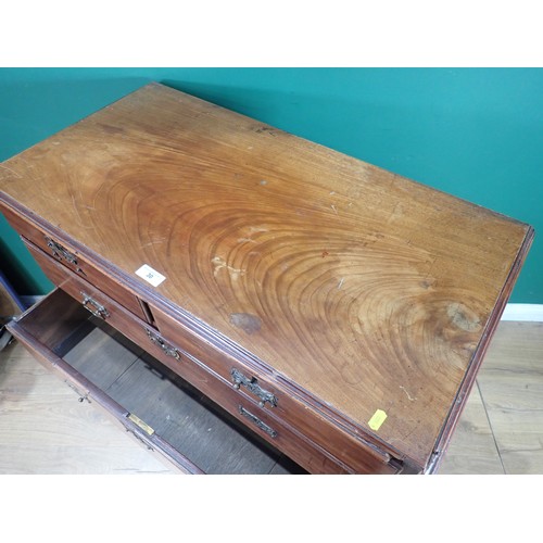 561 - A Georgian mahogany Chest of two short and four graduated long drawers mounted on ogee bracket feet ... 