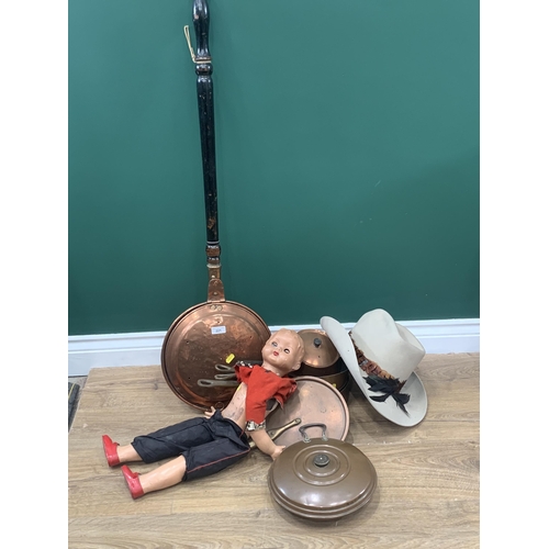 221 - A set of graduated copper Cooking Pans, Warming Pan, Doll and a Stetson Hat