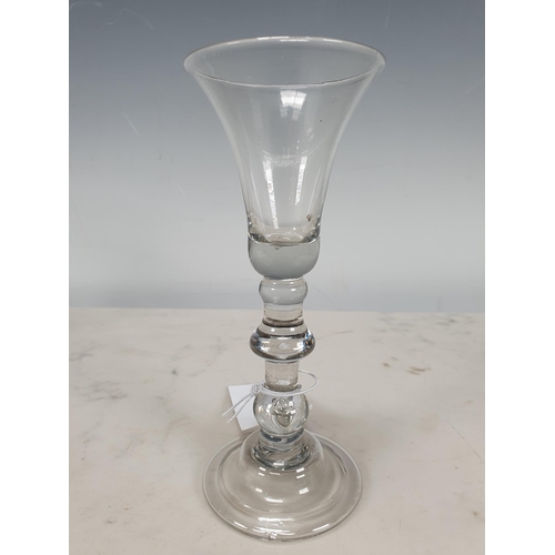 342 - An antique Wine Glass with trumpet bowl, knopped stem and domed base and an antique Wine Glass with ... 