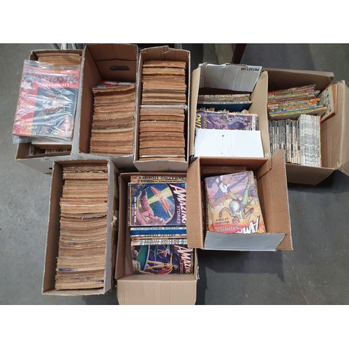 830 - Eight boxes of Comics including 'The Man from Mars'