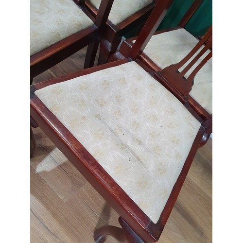 463 - A set of four mahogany splat back Dining Chairs with cream floral upholstered drop in seats. and ano... 