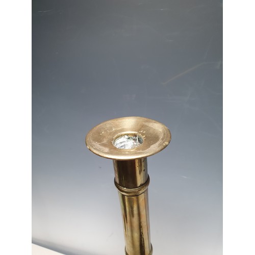 18 - A large antique brass Candlestick with slide ejector on circular base, 18in and a Bronze Mortar, 4in