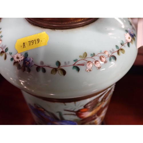 87 - A Victorian opaque glass Oil Lamp painted fruit urn, bird etc with Hinks Duplex Patent mechanism.