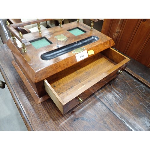 492 - A 19th Century walnut veneered Desk Stand with raised gallery, single fitted drawer and pull out lea... 