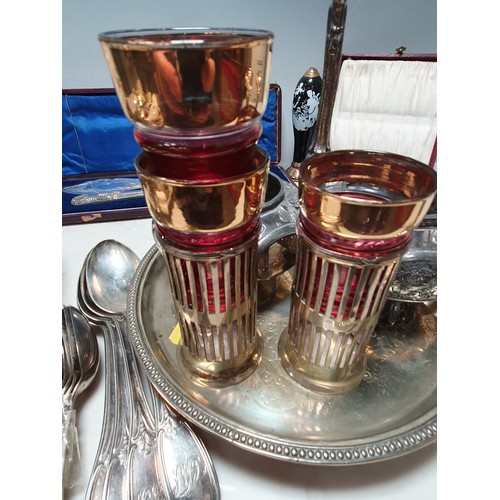 63 - A pair of Victorian silver mounted plated Fish Servers, in case, pair of plated Candlesticks, Salver... 