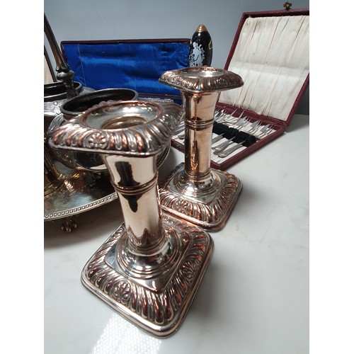 63 - A pair of Victorian silver mounted plated Fish Servers, in case, pair of plated Candlesticks, Salver... 