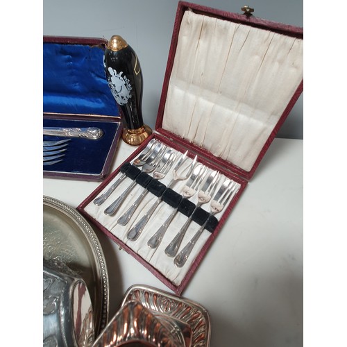 63 - A pair of Victorian silver mounted plated Fish Servers, in case, pair of plated Candlesticks, Salver... 