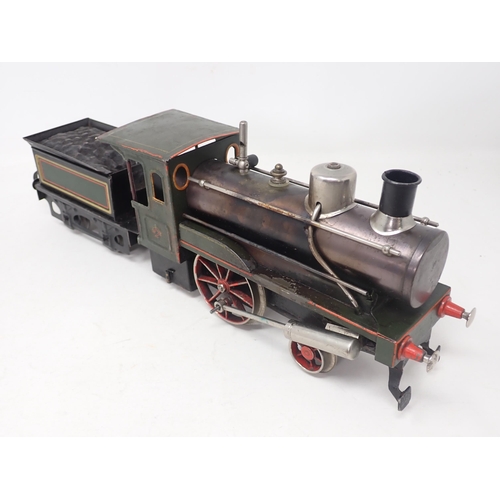 177 - A Carette gauge 1 live steam 2-2-0 Stork Leg Locomotive and tender in green livery