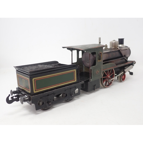 177 - A Carette gauge 1 live steam 2-2-0 Stork Leg Locomotive and tender in green livery