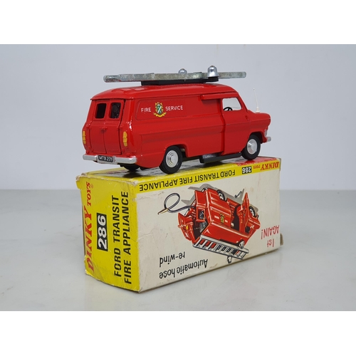 100 - A boxed Dinky Toys No.286 Ford Transit Fire Appliance