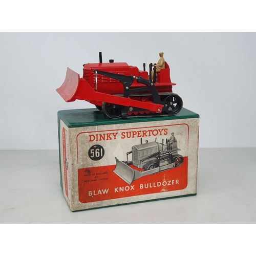104 - A boxed Dinky Toys No.561 Blaw Know Bulldozer with card packing