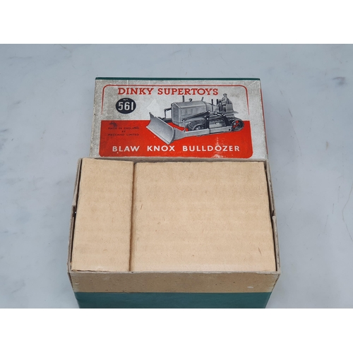104 - A boxed Dinky Toys No.561 Blaw Know Bulldozer with card packing