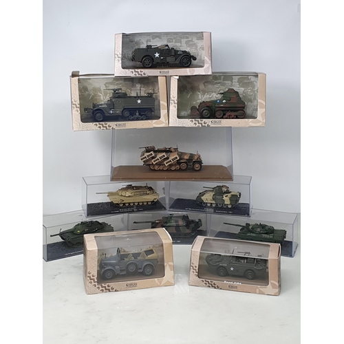 118 - Fourteen boxed Atlas Edition Military Vehicle Models and six other Military Vehicles