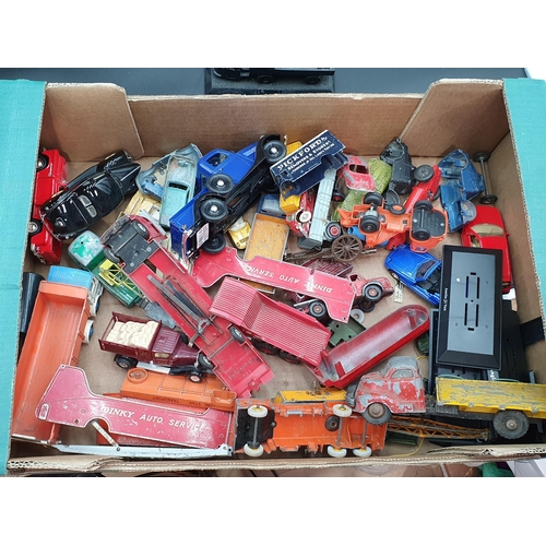 121 - A box of play worn diecast Models including Dinky Toys Matchbox, Triang Spot-on and an unboxed Victo... 