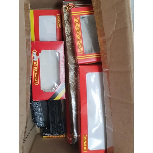 167 - Seven boxed Hornby 00 gauge Wagons and a quantity of unboxed Bachmann and Peco Wagons