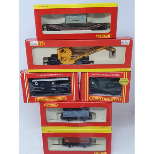 167 - Seven boxed Hornby 00 gauge Wagons and a quantity of unboxed Bachmann and Peco Wagons