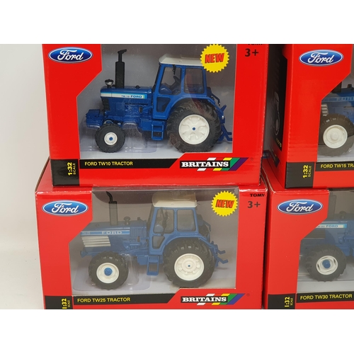 193 - Four boxed Britains Tractors including Ford TW10, TW15, TW25 and TW30 and a boxed Lamborghini Ergoma... 