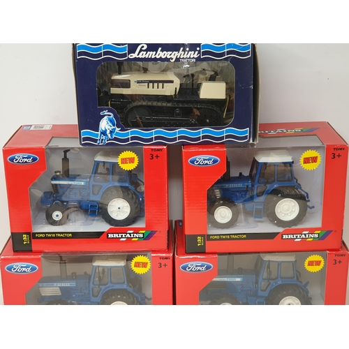 193 - Four boxed Britains Tractors including Ford TW10, TW15, TW25 and TW30 and a boxed Lamborghini Ergoma... 