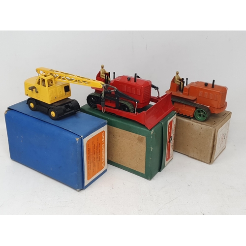 194 - A boxed Dinky Toys No 571 Mobile Crane, a boxed No.561 Blaw Knox Bulldozer, a boxed No.563 Heavy Tra... 