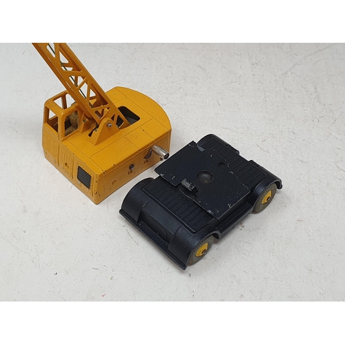 194 - A boxed Dinky Toys No 571 Mobile Crane, a boxed No.561 Blaw Knox Bulldozer, a boxed No.563 Heavy Tra... 